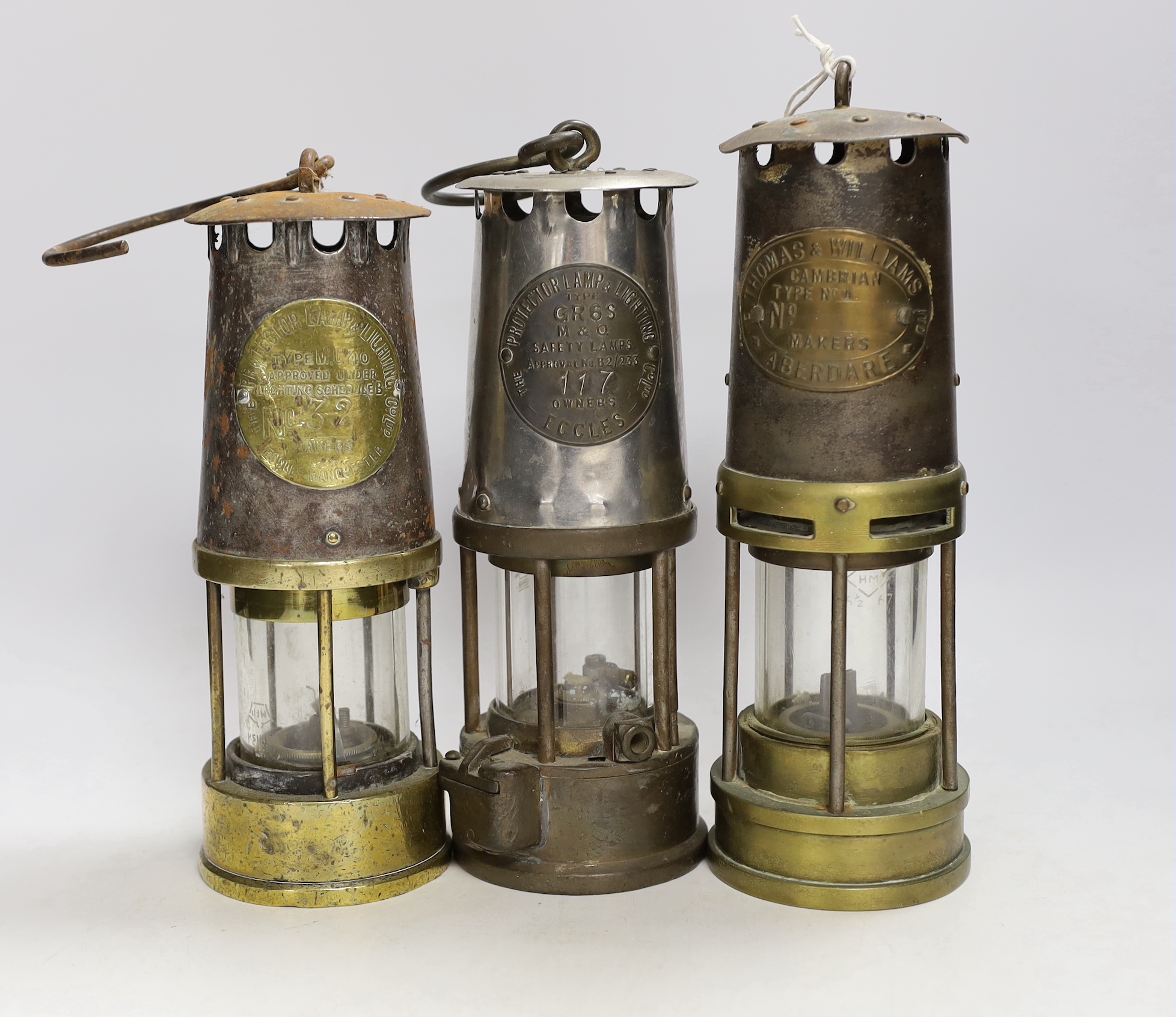 Three miner's lamps